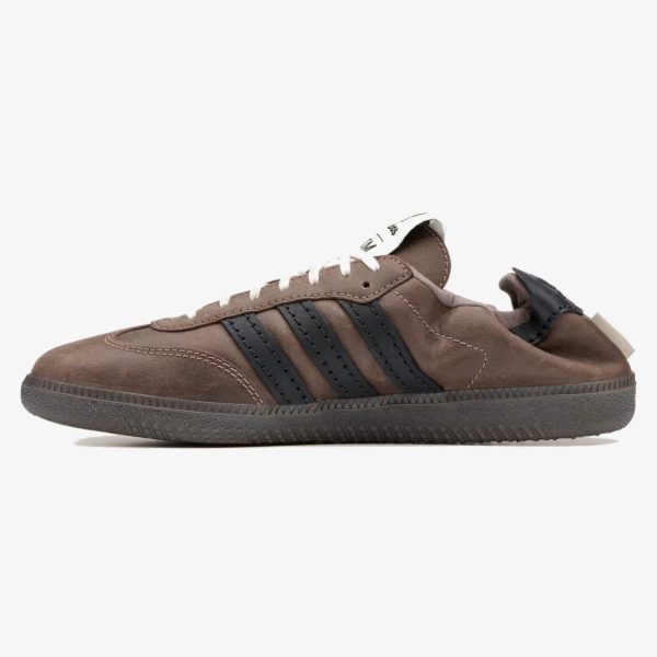 Brown SFTM Samba OG Decon sneaker with black and gold details