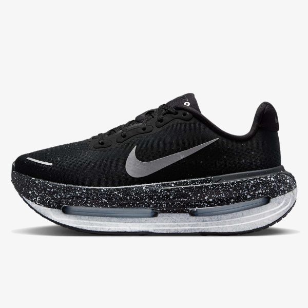 women's black nike running shoes - Women's black and white Nike road-running shoe with metallic silver details
