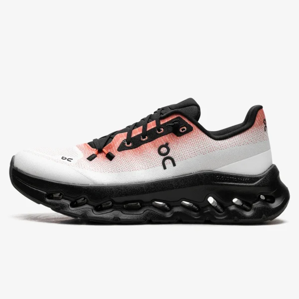 Women's ON Cloudtilt sneaker in Flame and Eclipse with an engineered mesh upper and sculpted cushioned sole.